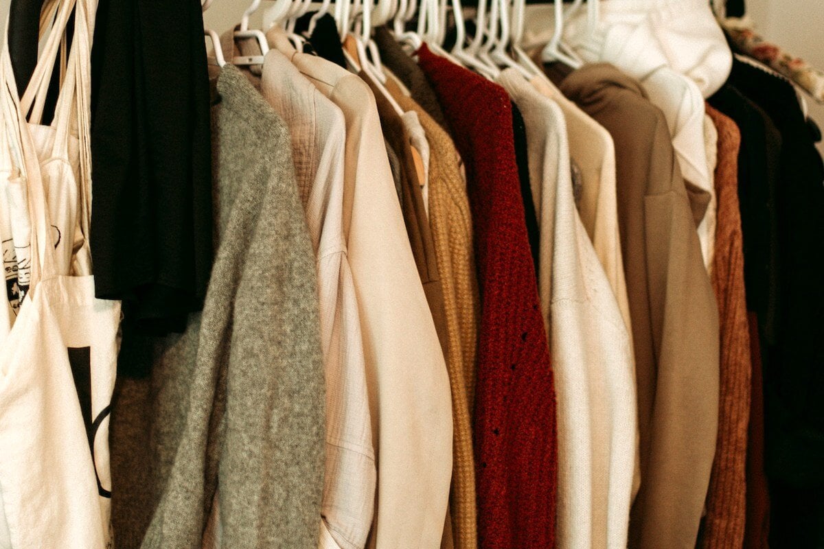 sweaters-hanging-in-closet