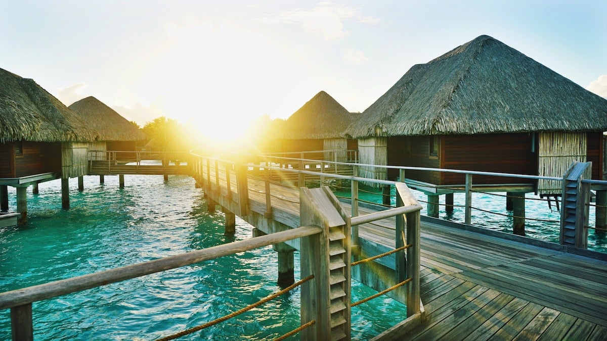 tropical family vacation bora bora water huts