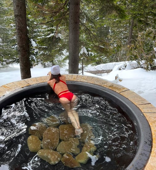 woman-red-bathing-suit-hot-tub-winter