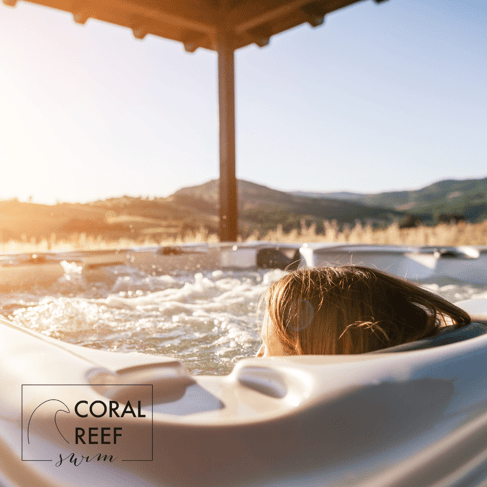woman-sitting-in-hot-tub-outside-sunset